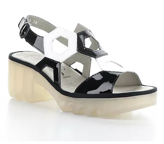 geometric cut out black and white wedge platform sandal with heel and adjustable strap side profile