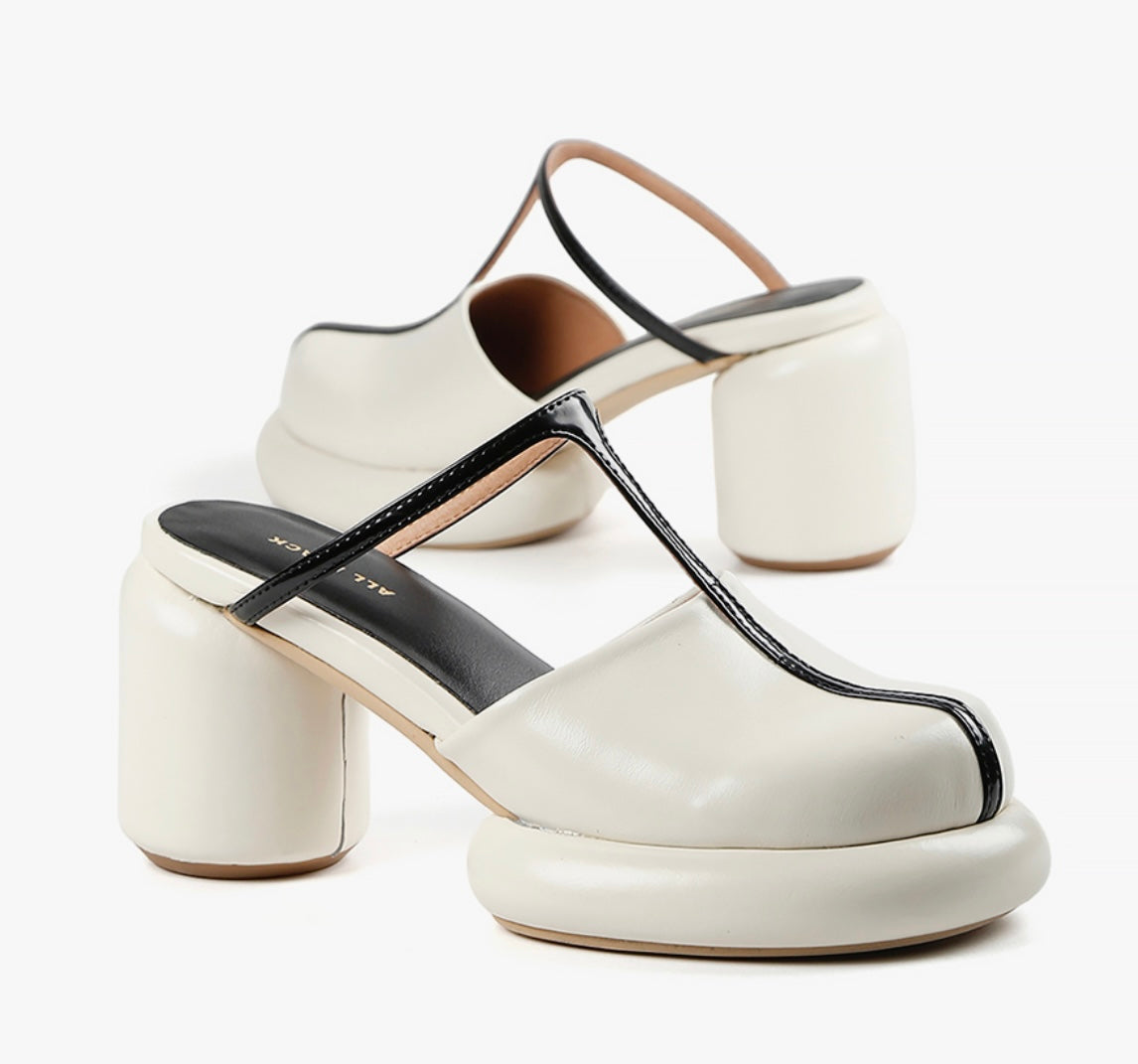 futuristic bubble heel design and t strap topper slip on heel mule sandal pair