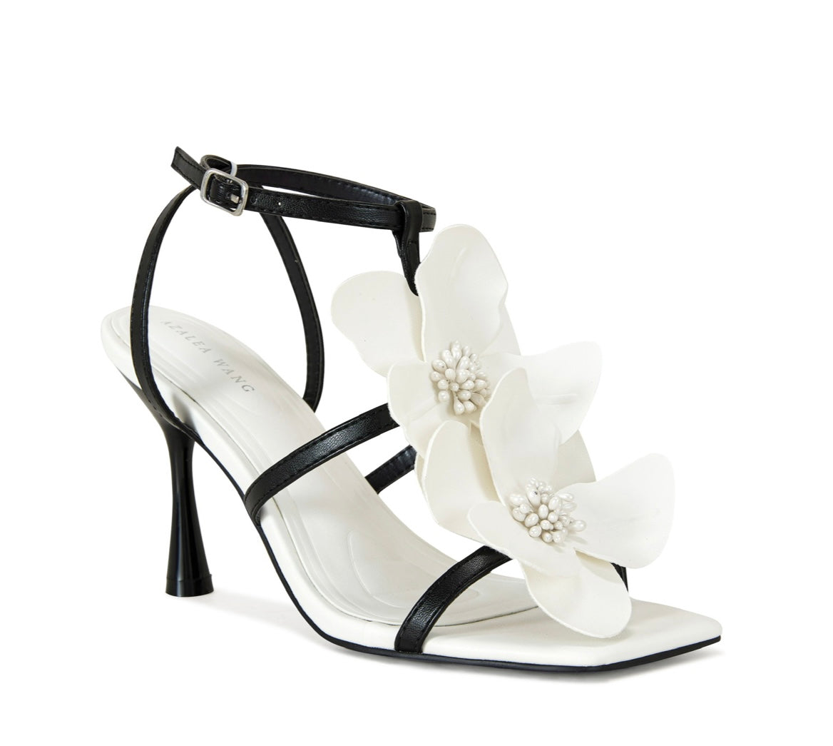 black and white strappy stiletto heel with laser cut floral applique side view