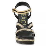 black and tan woven material platform block heel sandal with adjustable ankle strap from front