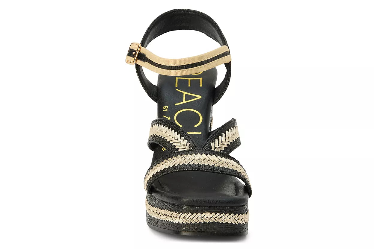 black and tan woven material platform block heel sandal with adjustable ankle strap from front