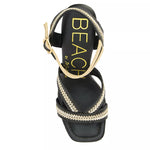 black and tan woven material platform block heel sandal with adjustable ankle strap from top
