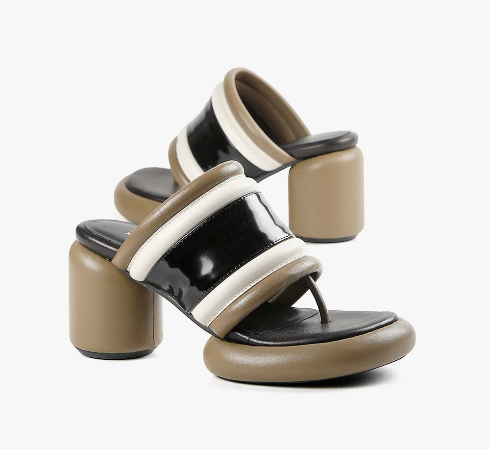 Brown, black, and white bubble modern backless heel sandal pair