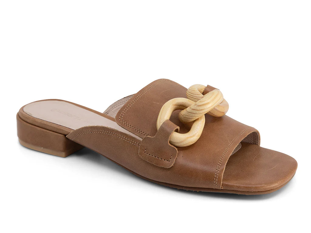 brown leather mule open back low heel slip on slide shoe with decorative wooden detail close up