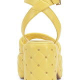 puffy leather chunky heel sandal with adjustable ankle strap in yellow from back