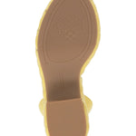 puffy leather chunky heel sandal with adjustable ankle strap in yellow from bottom