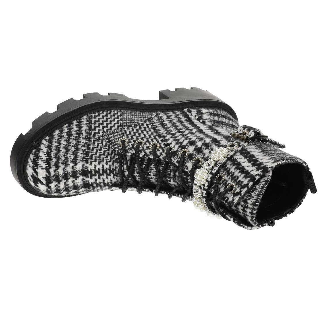 black and white houndstooth style design chunky heeled platform booth with pearl like embellishments on strap. Features side zipper and black shoe laces. Side flat view