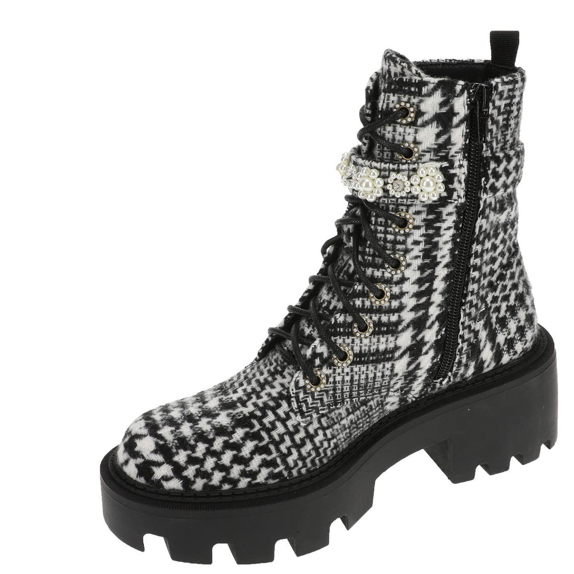 black and white houndstooth style design chunky heeled platform booth with pearl like embellishments on strap. Features side zipper and black shoe laces. Side zipper view