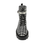 black and white houndstooth style design chunky heeled platform booth with pearl like embellishments on strap. Features side zipper and black shoe laces. Front view