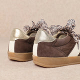 brown and white faux leather sneaker with animal print lace shoe lace detail pair back profile