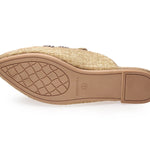 neutral tan colored slide mule with floral ribbon embroidery bottom