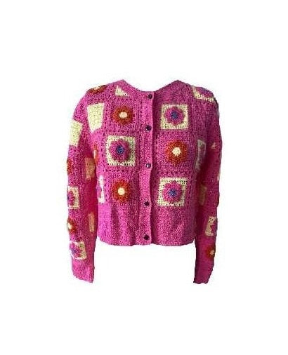 Pink crocheted cardigan with a pattern of colorful squares and flowers on a white background