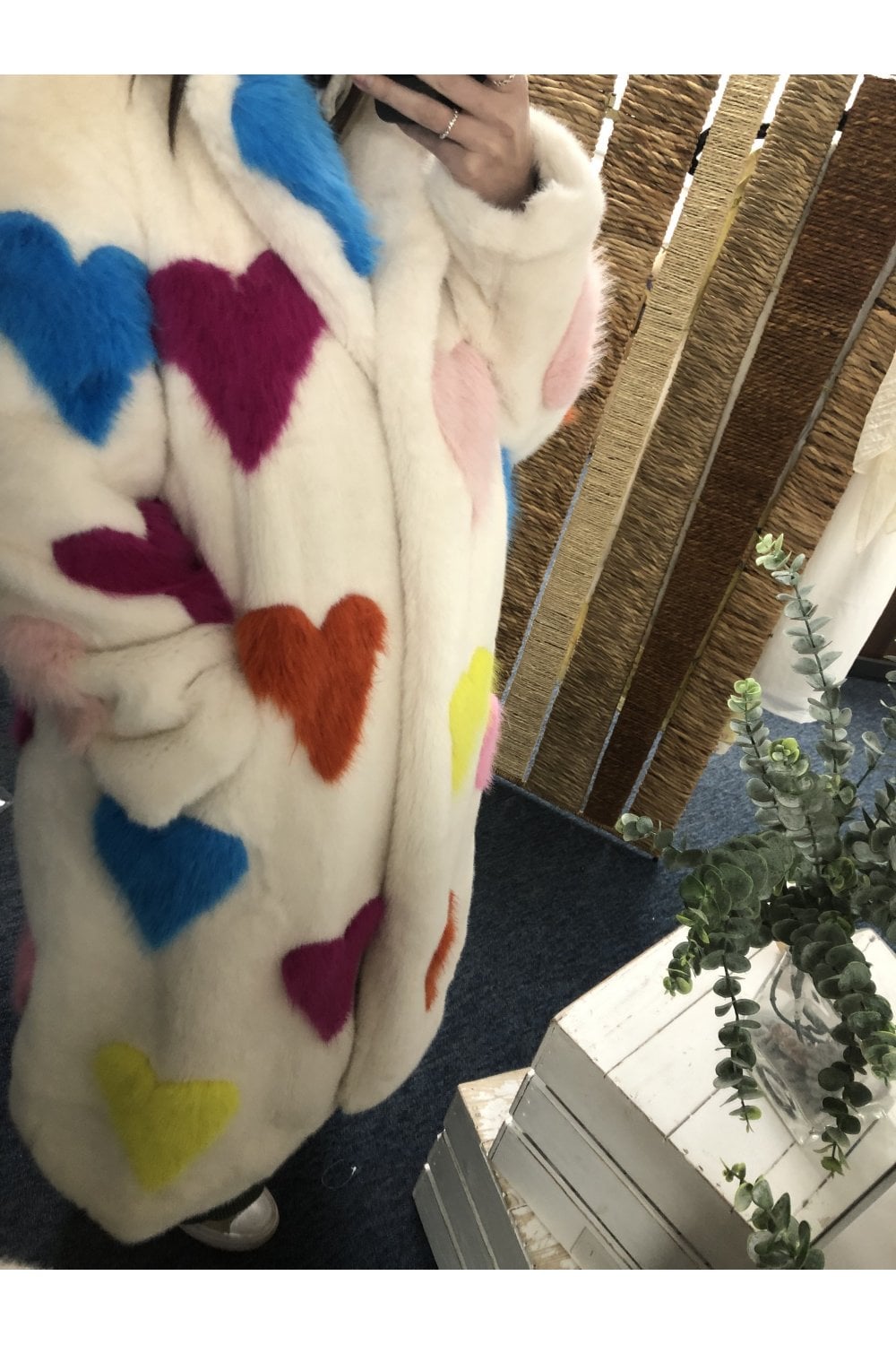 Colorful heart-patterned fabric with a blurred background
