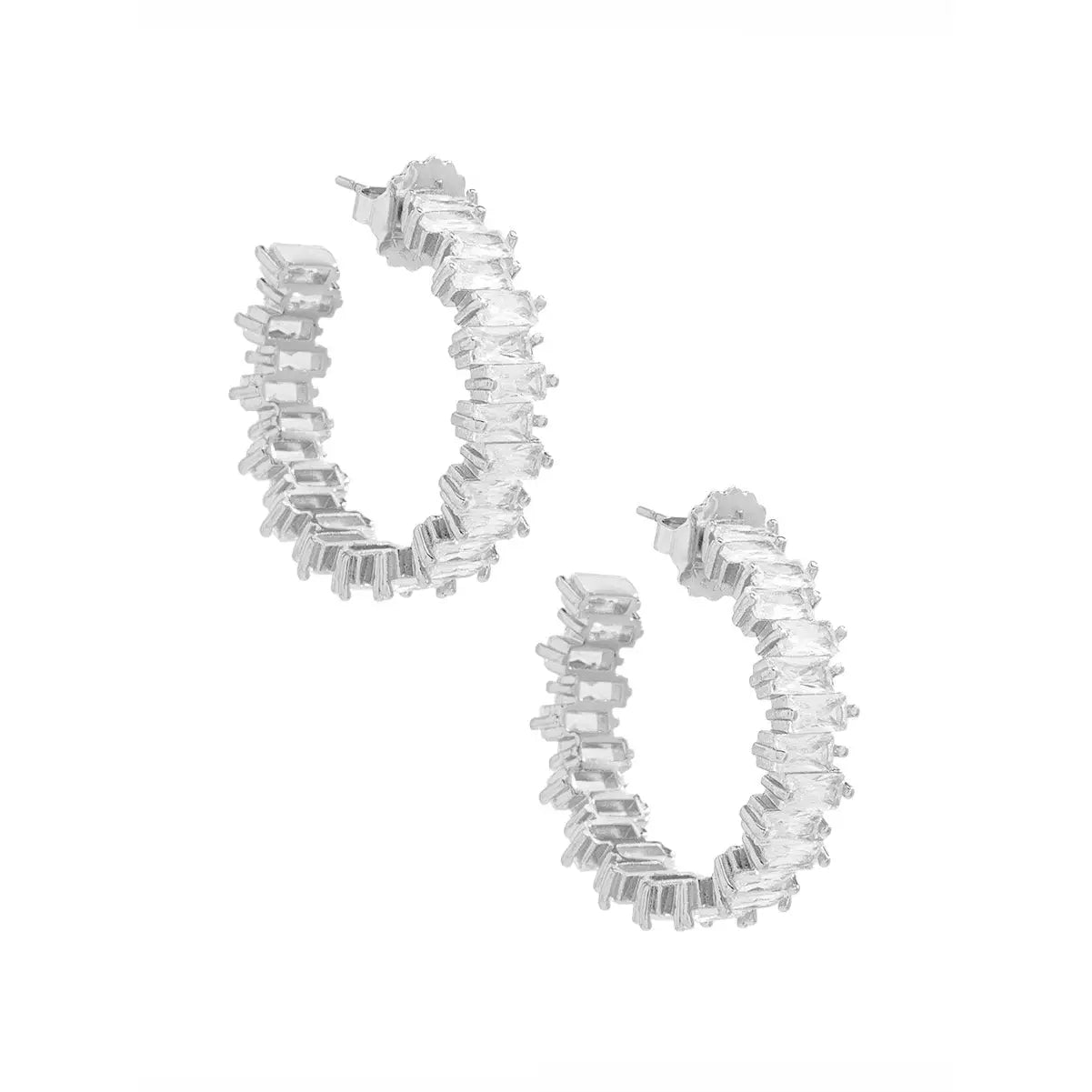 Silver hoop earrings with clear stones on a white background