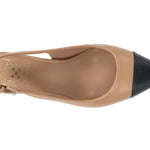 Leather slingback pump heel in tan and black with tapering toe by Vince Camuto top