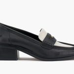 Black and cream colored leather loafer with heel full side view
