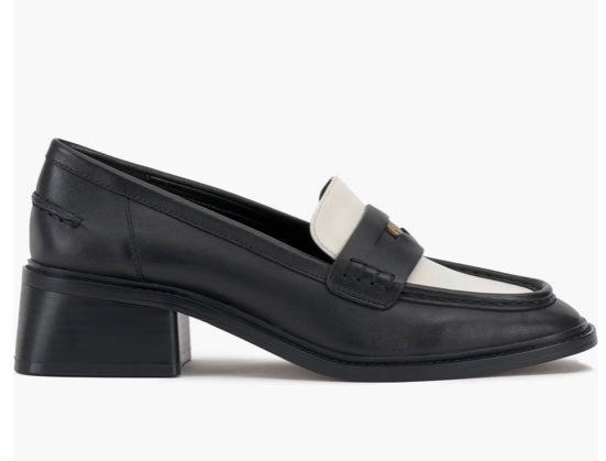 Black and cream colored leather loafer with heel full side view