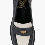Black and cream colored leather loafer with heel full top view.