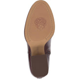 Brown knee-high tall shaft boot with soft round toe and a stacked block heel. Has zippered side closure and elastic inserts on the shaft for improved fit. The boot is lined with fabric and finished on the exterior with a leather-covered welt and rubber outsole bottom