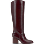 Brown knee-high tall shaft boot with soft round toe and a stacked block heel. Has zippered side closure and elastic inserts on the shaft for improved fit. The boot is lined with fabric and finished on the exterior with a leather-covered welt and rubber outsole.