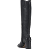Black knee-high tall shaft boot with soft round toe and a stacked block heel. Has zippered side closure and elastic inserts on the shaft for improved fit. The boot is lined with fabric and finished on the exterior with a leather-covered welt and rubber outsole back side