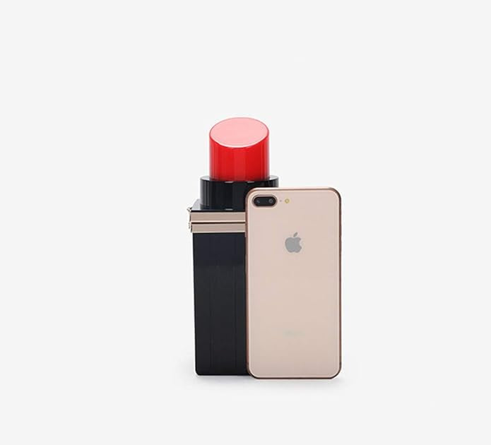 Black and red lipstick handbag with a gold chain phone for scale