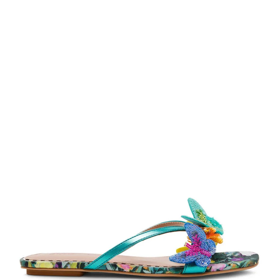 Colorful sandal with teal thong strap and butterfly embellishments close-up