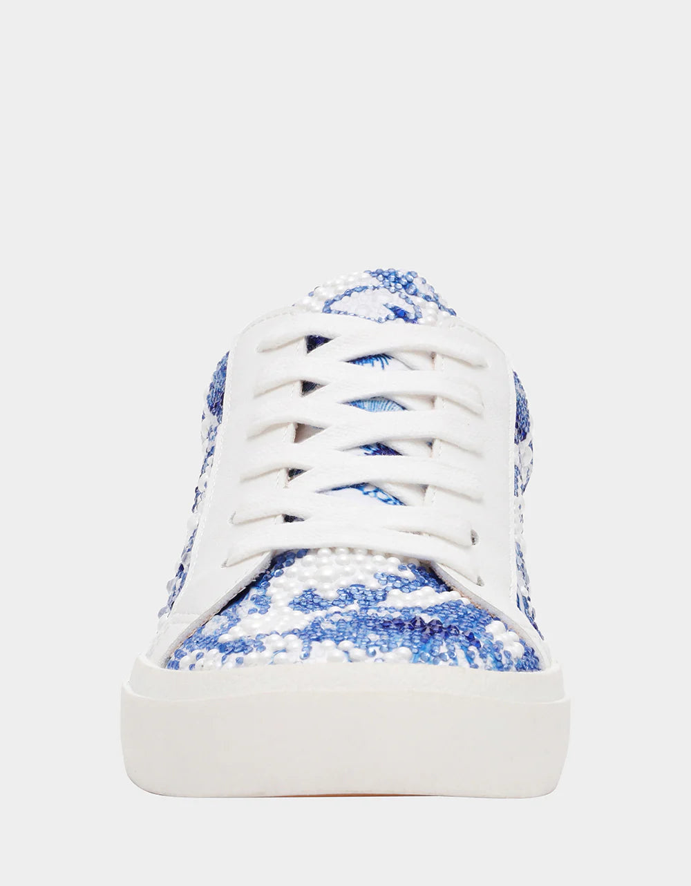 Blue and white patterned sneaker on a white background