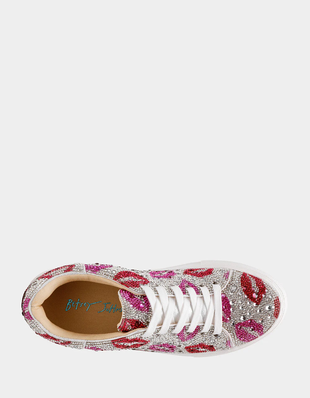 Sneaker with pink and red pattern on a white background