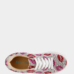 Sneaker with pink and red pattern on a white background