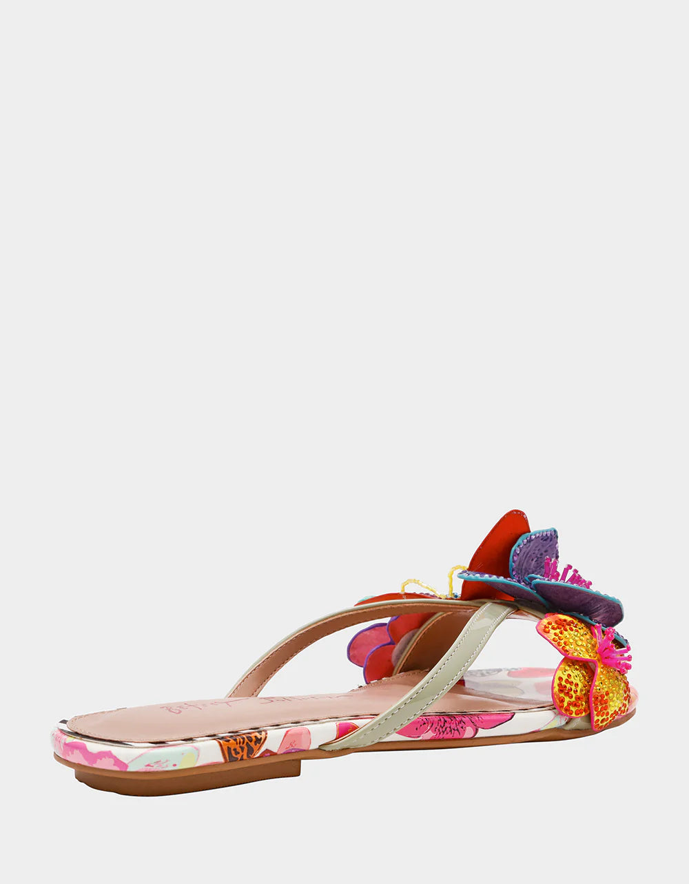 Colorful sandal with gold thong strap and butterfly embellishments side view