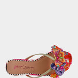 Colorful sandal with gold thong strap and butterfly embellishments top view