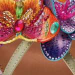 Colorful sandal with gold thong strap and butterfly embellishments detail