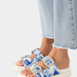 White sandal with blue bejeweled floral pattern and embellishments pair