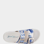 White sandal with blue bejeweled floral pattern and embellishments top view