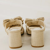 Rustic beige heel with a bow heel view