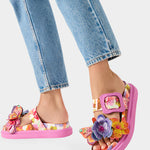 Colorful pink sandal with floral design and embellishments model