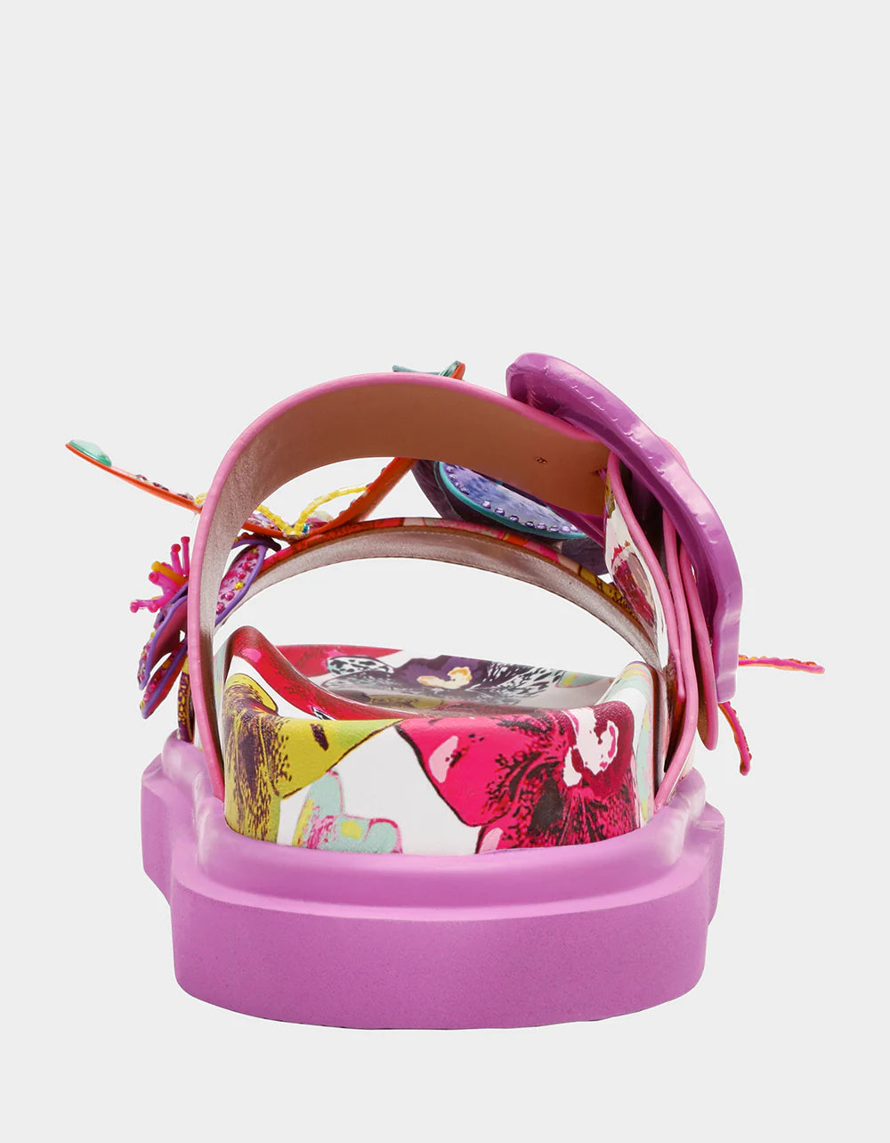 Colorful pink sandal with floral design and embellishments heel view