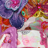 Colorful pink sandal with floral design and embellishments design