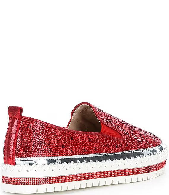 Red bejeweled slip-on shoe with a white sole heel view