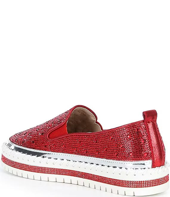 Red bejeweled slip-on shoe with a white sole inner side view