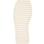 Red bejeweled slip-on shoe with a white sole sole