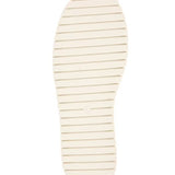 Red bejeweled slip-on shoe with a white sole sole