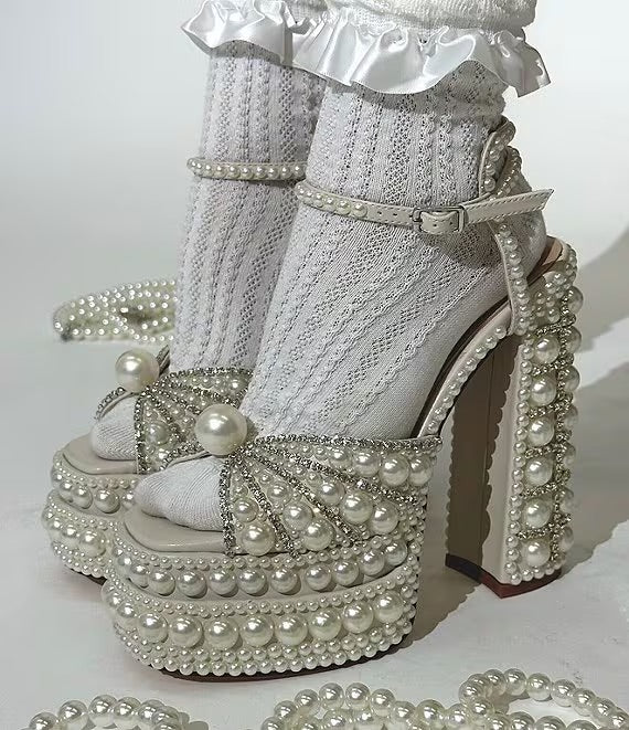 Elegant high-heeled shoe with pearl embellishments model