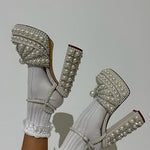 Elegant high-heeled shoe with pearl embellishments model 2