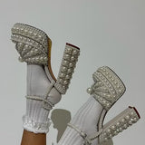 Elegant high-heeled shoe with pearl embellishments model 2