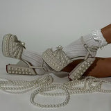 Elegant high-heeled shoe with pearl embellishments model 3