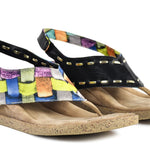 Colorful woven sandal with a black strap close-up