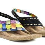 Colorful woven sandal with a black strap close-up
