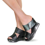 Black wedge sandals with alligator-like leather model